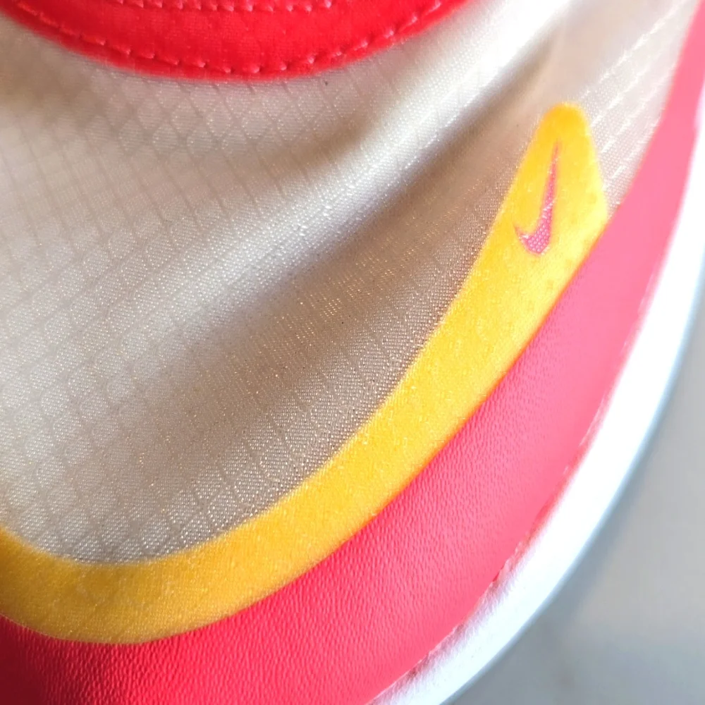 Nike Pink and Yellow Athletic Shoes with Sleek Design - Picture 2 of 6